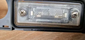 Volkswagen Touran I Barra de luz de la matrícula/placa de la puerta del maletero 1T0827574