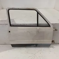Nissan Almera N16 Drzwi przednie 