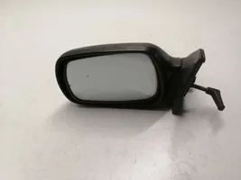 Toyota Starlet (P80) IV Manual wing mirror E200737