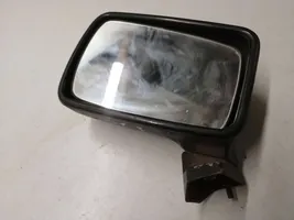 Volkswagen Golf I Manual wing mirror E1011712