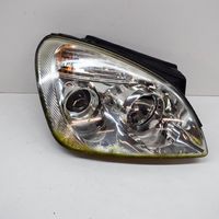 KIA Carens II Lampa przednia 