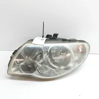 Chrysler Voyager Lampa przednia 04857831AC