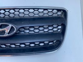 Hyundai Santa Fe Maskownica / Grill / Atrapa górna chłodnicy E865612B010