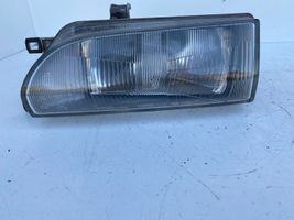 Toyota Corolla E90 Lampa przednia 12307