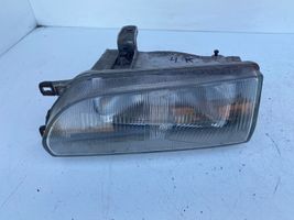 Toyota Corolla E90 Lampa przednia 12307