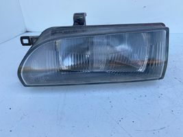 Toyota Corolla E90 Lampa przednia 12307