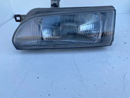 Toyota Corolla E90 Lampa przednia 201653B