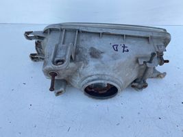 Toyota Corolla E90 Lampa przednia 2121140