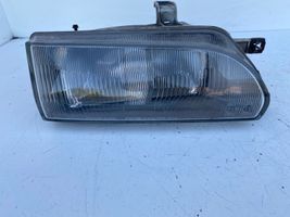 Toyota Corolla E90 Lampa przednia 12307