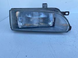 Toyota Corolla E90 Lampa przednia 12307