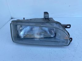 Toyota Corolla E90 Lampa przednia 12307