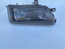 Toyota Corolla E90 Lampa przednia 12307