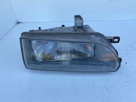 Toyota Corolla E90 Lampa przednia 12307