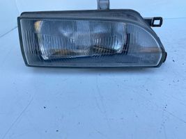 Toyota Corolla E90 Lampa przednia 12307