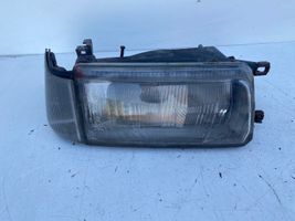 Toyota Corolla E80 Lampa przednia 12217