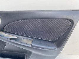 Toyota Avensis T220 Rivestimento del pannello della portiera anteriore 