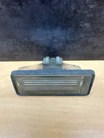 Audi A4 S4 B5 8D Lampa oświetlenia tylnej tablicy rejestracyjnej 04557080