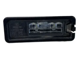 Volkswagen PASSAT B8 Lampa oświetlenia tylnej tablicy rejestracyjnej 1K8943021D