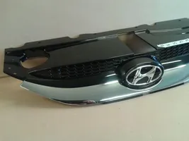 Hyundai ix35 Grille calandre supérieure de pare-chocs avant 