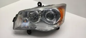 Chrysler Grand Voyager V Lampa przednia 05113339AD