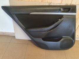 Toyota Avensis T250 Rivestimento del pannello della portiera posteriore 6764005A20