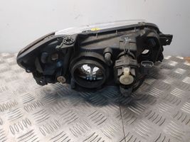 Mazda 323 F Lampa przednia 1157NA