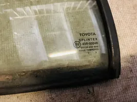 Toyota Carina T190 Vetro del deflettore posteriore 