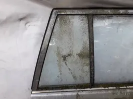 Mazda 323 Szyba karoseryjna drzwi tylnych 