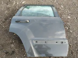 Jeep Grand Cherokee (WK) Rear door pilkos