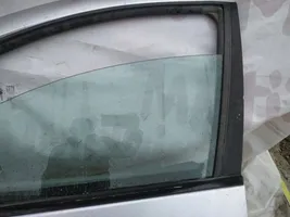 Nissan Almera Tino priekšējo durvju stikls (četrdurvju mašīnai) 