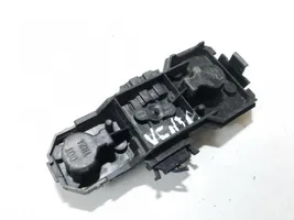 Volkswagen Vento Takavalon polttimon suojan pidike 1h5945259
