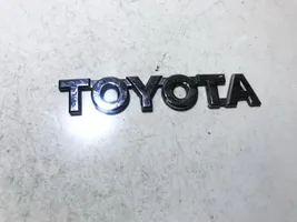 Toyota Corolla E110 Gamintojo ženkliukas 