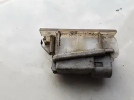 Renault Megane II Lampa oświetlenia tylnej tablicy rejestracyjnej 7700796163