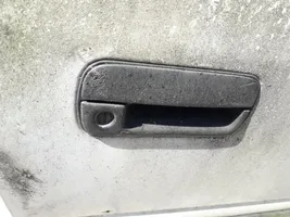 Hyundai Pony Front door exterior handle 