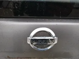 Nissan X-Trail T30 Mostrina con logo/emblema della casa automobilistica 