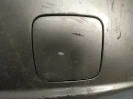 Nissan Almera N16 Takapuskurin hinaussilmukan suojakansi 