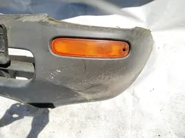 Mazda 121 Zderzak przedni pilkas