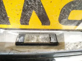 Nissan Primera Lampa oświetlenia tylnej tablicy rejestracyjnej 