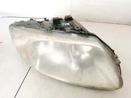 Chrysler Voyager Lampa przednia 04857702AB