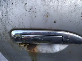 Nissan Primera Poignée extérieure de porte avant 