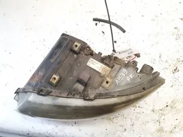 Chrysler Voyager Lampa przednia 04857703abf