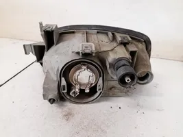 Renault Clio I Lampa przednia 7701042148