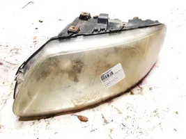 Chrysler Voyager Lampa przednia 04857703AB