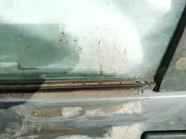Ford Orion Listón embellecedor de la ventana de la puerta trasera 