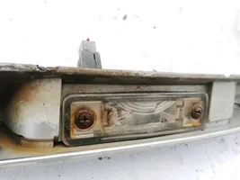 Opel Vectra B Lampa oświetlenia tylnej tablicy rejestracyjnej 