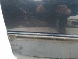 Mazda 323 Listwa drzwi tylnych 