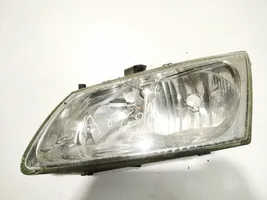 Nissan Almera N16 Lampa przednia 89003331