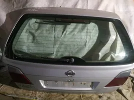 Nissan Primera Couvercle de coffre pilkas