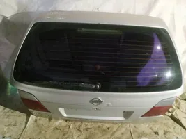 Nissan Primera Couvercle de coffre pilkas