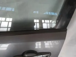 Mazda 3 I Moulure de vitre de la porte avant 